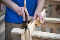 Versiegelung eines Holz-Fenster in der Produktion bei PaX
