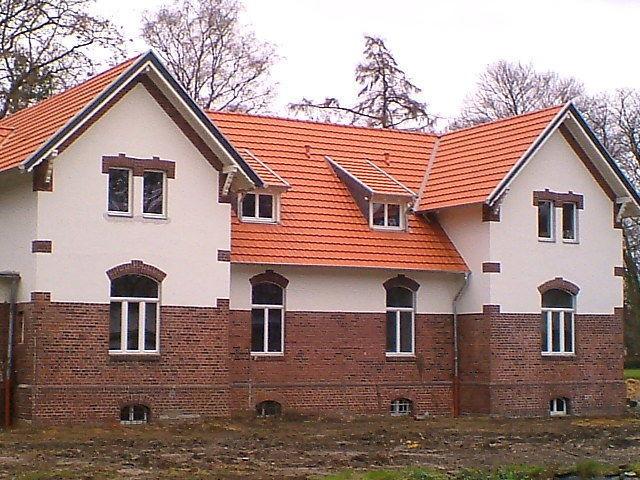 Jahrhundertwende-Pförtnerhaus mit PaXretro58 Fenstern aus Kiefer in Krefeld