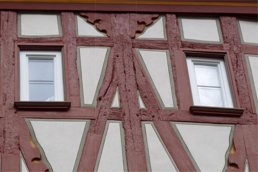 Neue PaXretro58 Fenster aus Kiefer mit Karniesbleisprossen für ehemaliges Stadtschreiberhaus in Bad Kreuznach Nahaufnahme