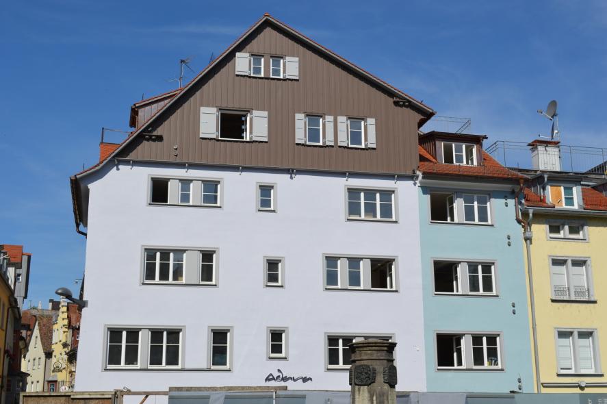 Wohn- und Geschäftshaus mit PaXretro58 aus Eukalyptus in Lindau