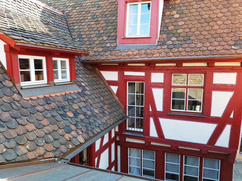 Ausgezeichnete Sanierung eines Fachwerkhauses mit PaXretro58 aus Kiefer in Ulm Innenhof