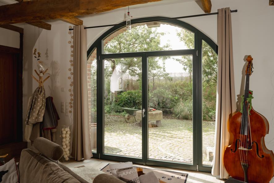 Holz-Haustür mit Lichtausschnitt und Sprossenfenster in Viersen Innenansicht